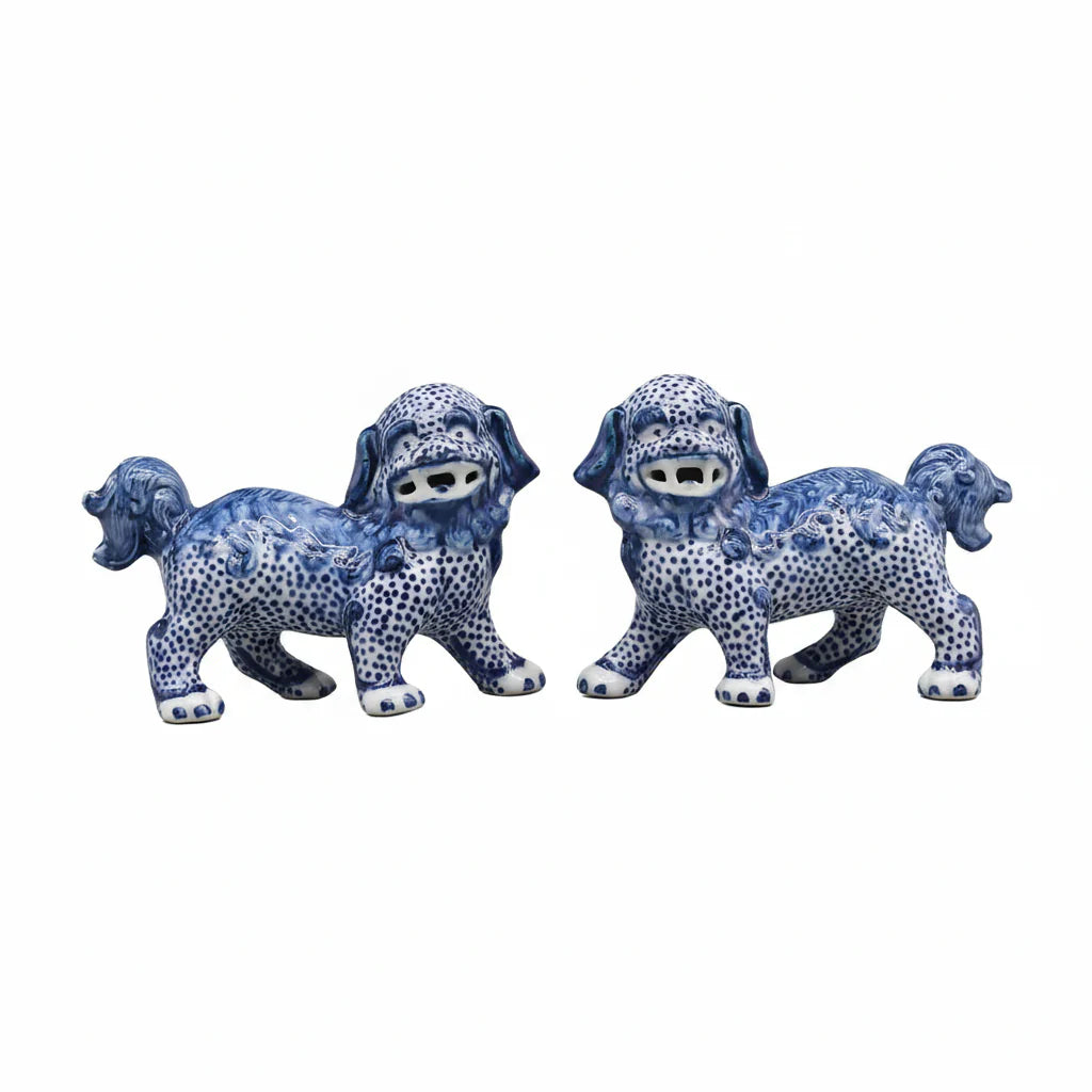 Pair of Blue & White Ceramic Walking Lion Statues