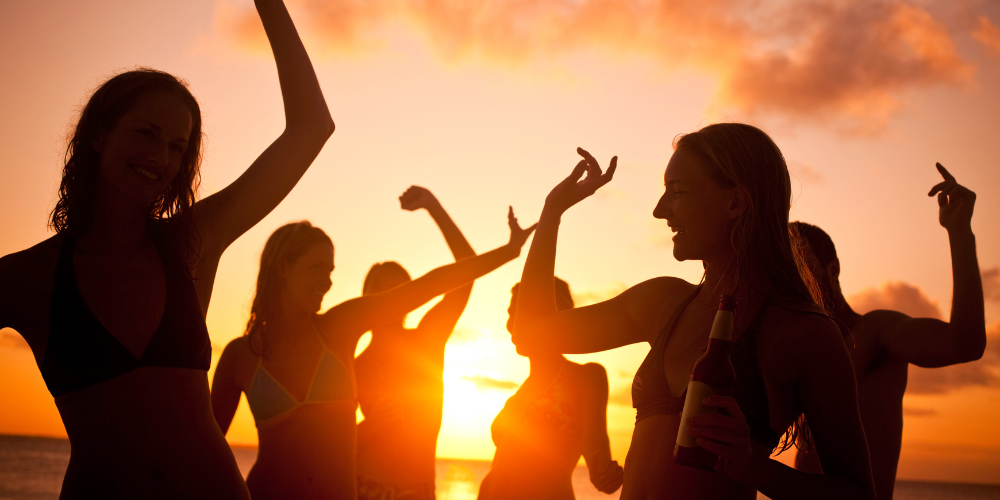 Bask in Joy: Exploring Ibiza's Enchanting Sunset Beach Parties