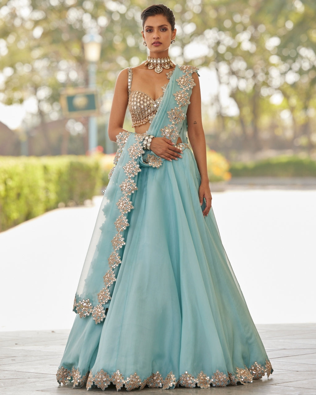 Powder Blue Organza Mirror Embroidered Lehenga Set By KYNAH, Luxury Indian Fashion & Bridal Wear