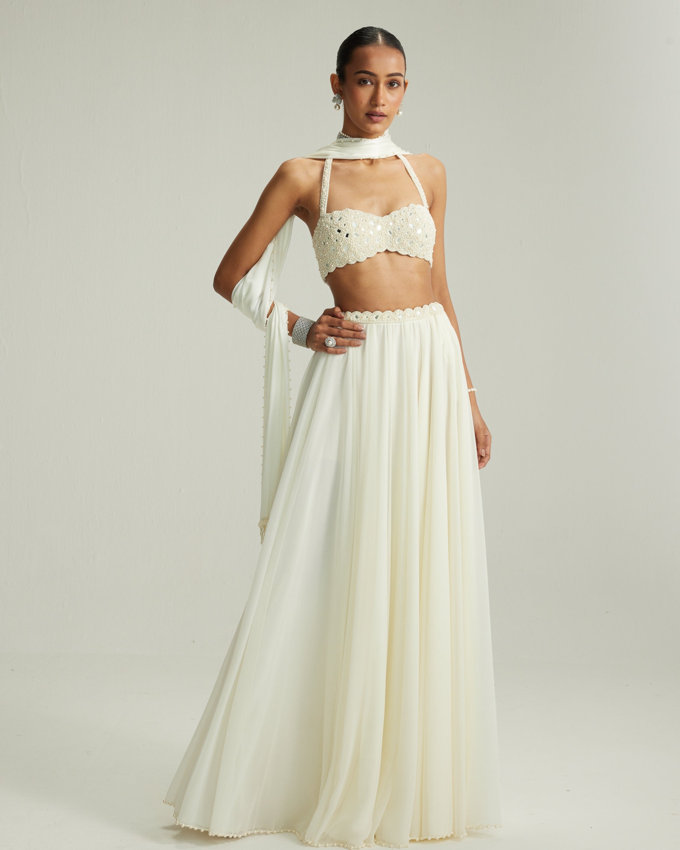 Off White Skirt Set With Halter Neck Blouse By KYNAH, Luxury Indian Fashion & Bridal Wear