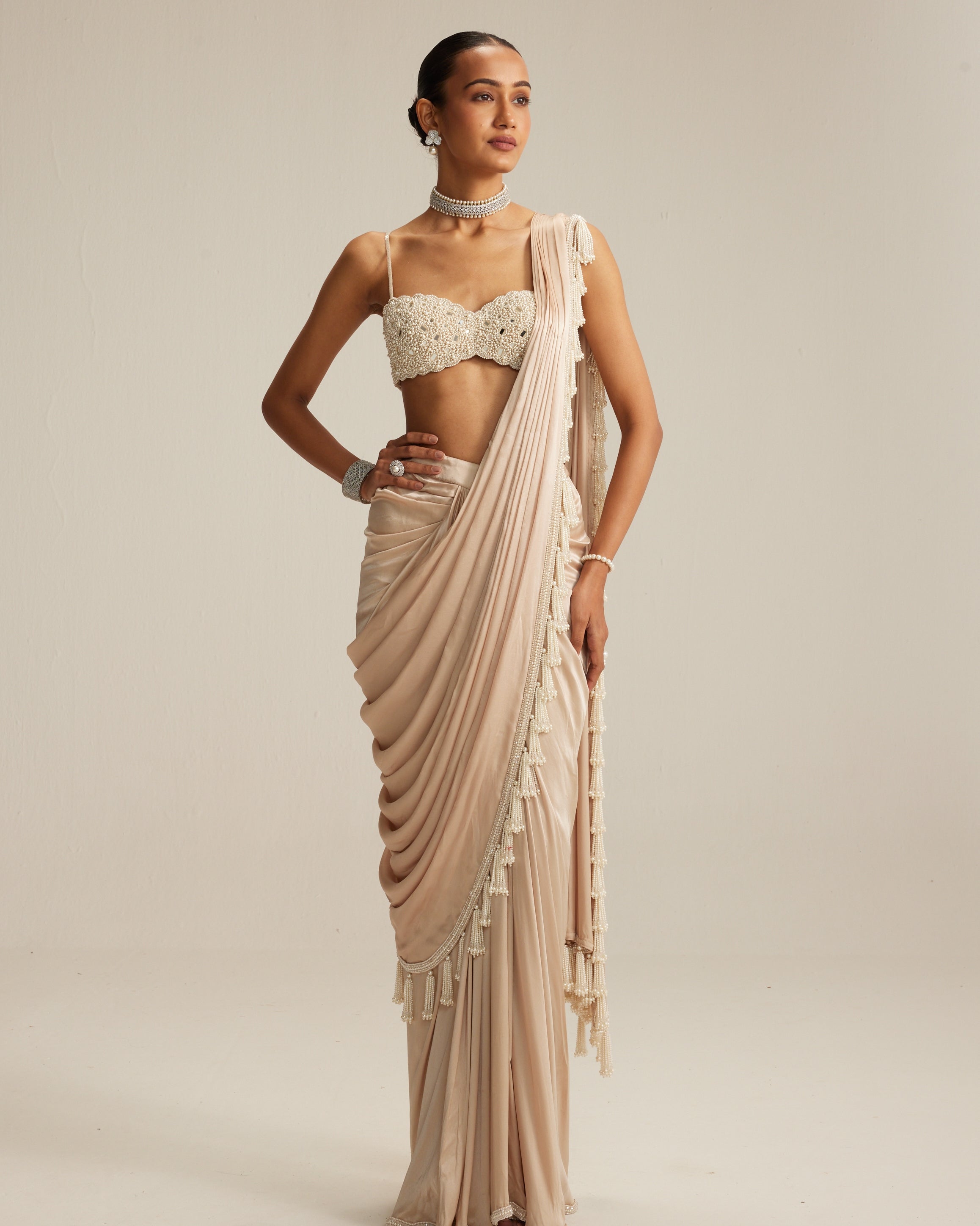 Light Beige Mirror And Pearl Satin Draped Sari Set By KYNAH, Luxury Indian Fashion & Bridal Wear