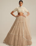 Light Beige Pearl Drop Multi Tier Lehenga With High Neck Blouse Set By KYNAH, Luxury Indian Fashion & Bridal Wear