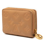 Monogram Embossed Lambskin Lou Coussin Wallet
