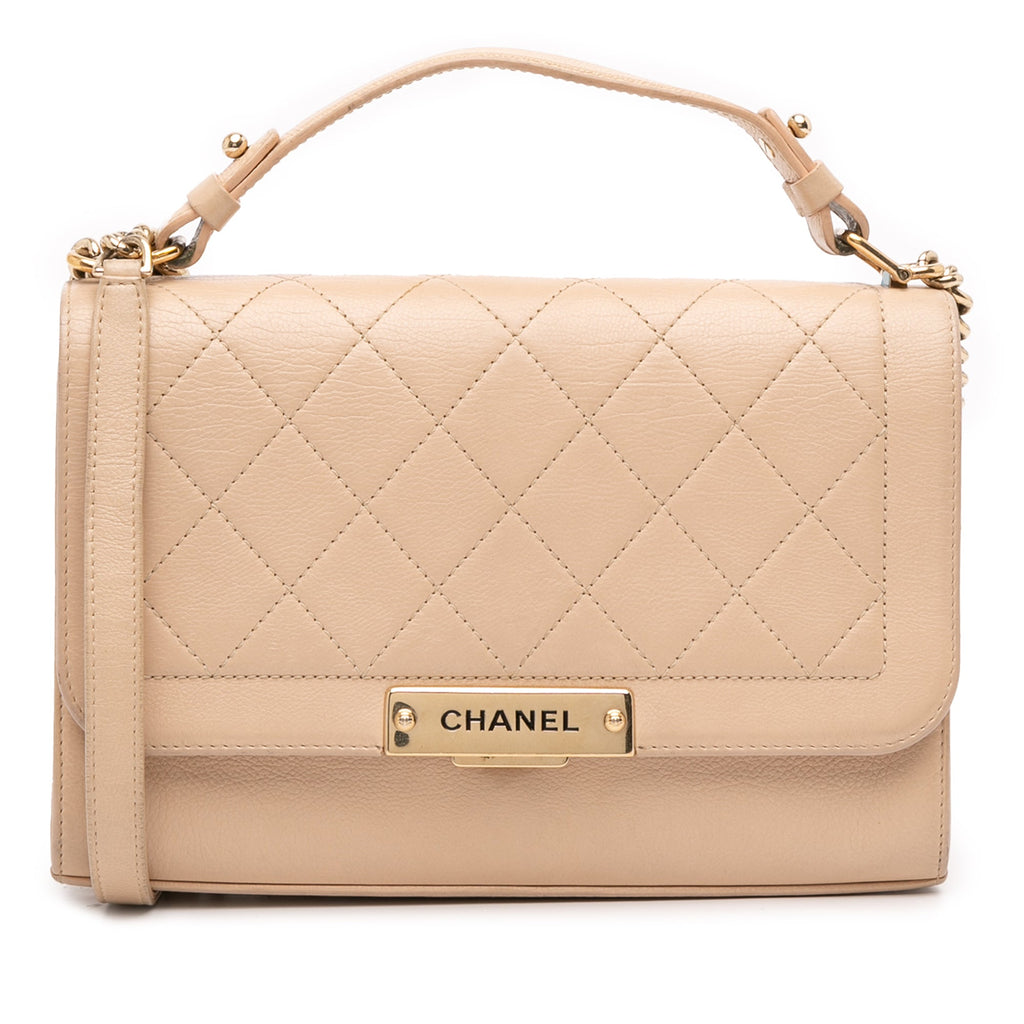 Medium Quilted Calfskin Label Click Flap