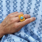 Anillo grande color mostaza turquesa