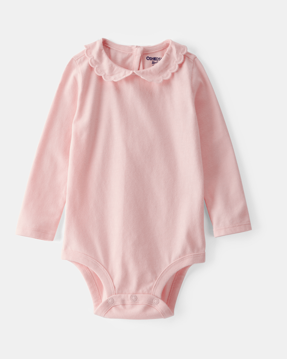 Body rosa de manga larga con cuello festoneado