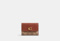 COACH® Women's Cartera tarjetera básica en lona de firma | Pvc