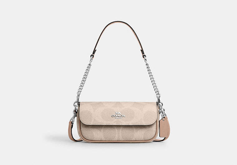 COACH® Women's Bolso con solapa Hailey de lona de firma en Beige | Pvc