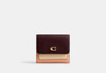 COACH® Women's Cartera con solapa pequeña Mila con bloques de color en Rojo | Cuir