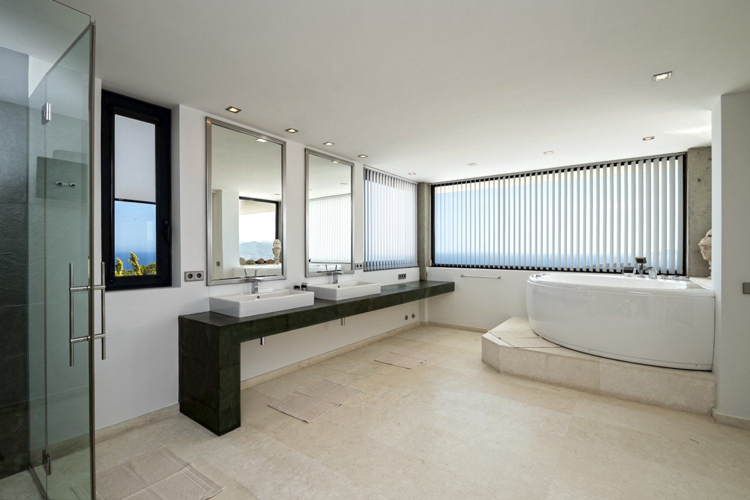 Hillside Contemporary Style Ibiza Villa with Panoramic Views of the Island near Cala Roja Cove and Talamanca Beach in Ibiza Town