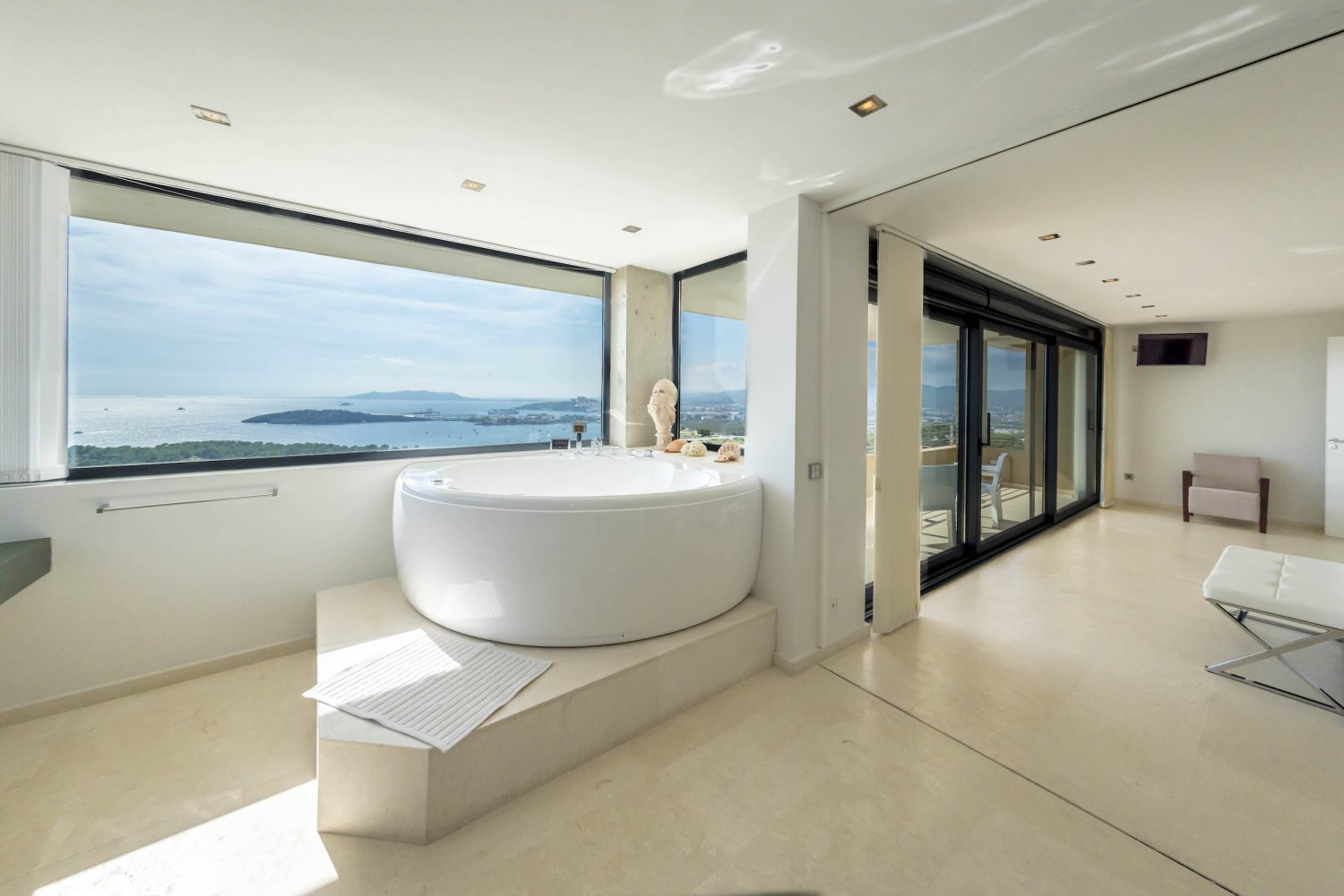 Hillside Contemporary Style Ibiza Villa with Panoramic Views of the Island near Cala Roja Cove and Talamanca Beach in Ibiza Town