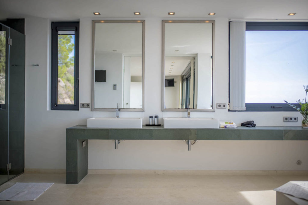 Hillside Contemporary Style Ibiza Villa with Panoramic Views of the Island near Cala Roja Cove and Talamanca Beach in Ibiza Town