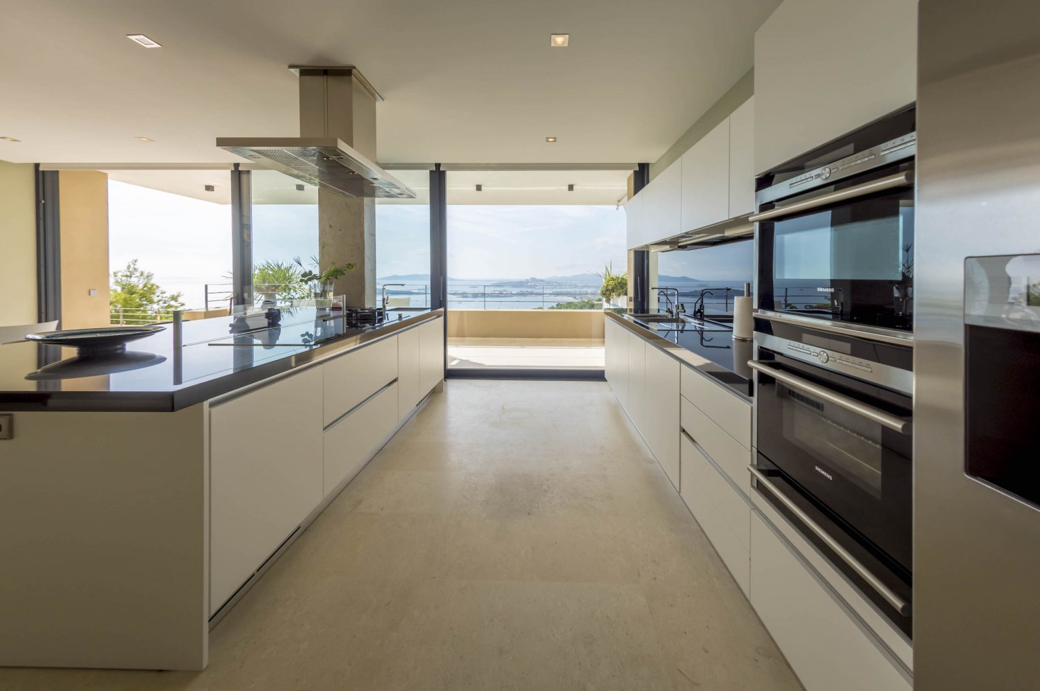 Hillside Contemporary Style Ibiza Villa with Panoramic Views of the Island near Cala Roja Cove and Talamanca Beach in Ibiza Town