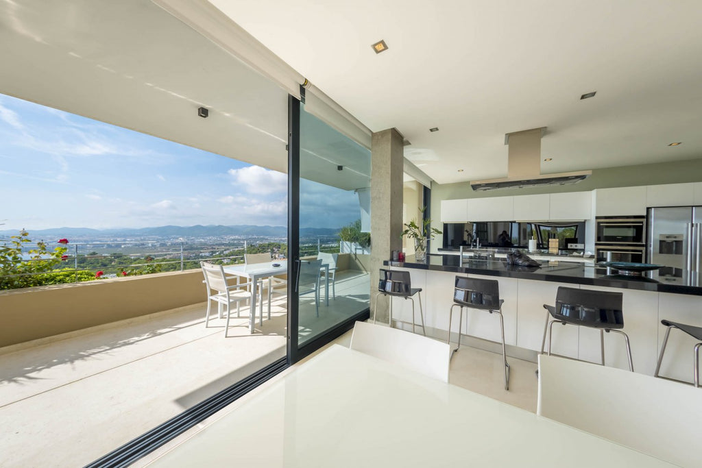 Hillside Contemporary Style Ibiza Villa with Panoramic Views of the Island near Cala Roja Cove and Talamanca Beach in Ibiza Town