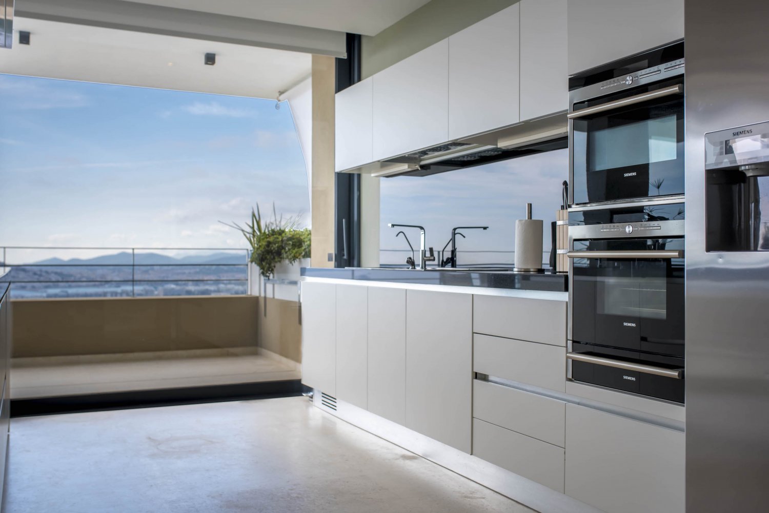 Hillside Contemporary Style Ibiza Villa with Panoramic Views of the Island near Cala Roja Cove and Talamanca Beach in Ibiza Town