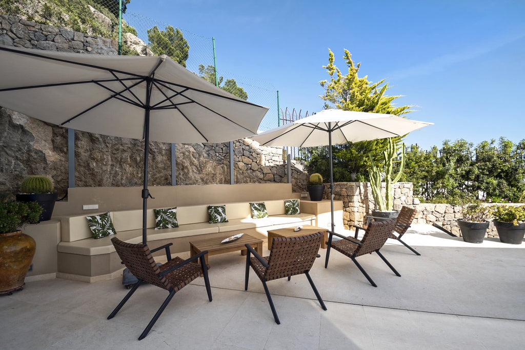 Hillside Contemporary Style Ibiza Villa with Panoramic Views of the Island near Cala Roja Cove and Talamanca Beach in Ibiza Town