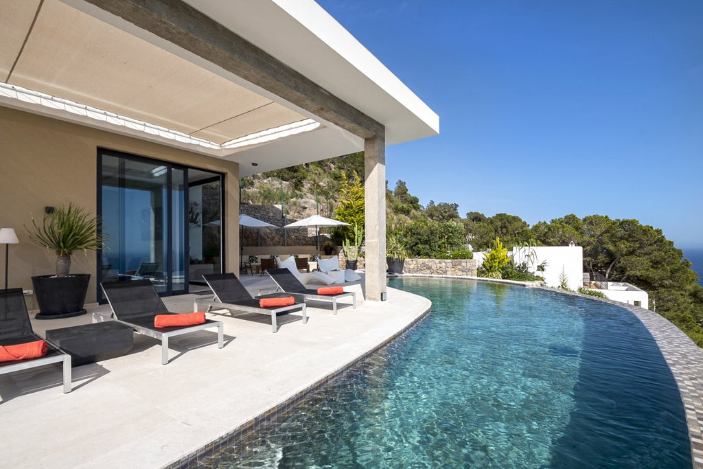 Hillside Contemporary Style Ibiza Villa with Panoramic Views of the Island near Cala Roja Cove and Talamanca Beach in Ibiza Town
