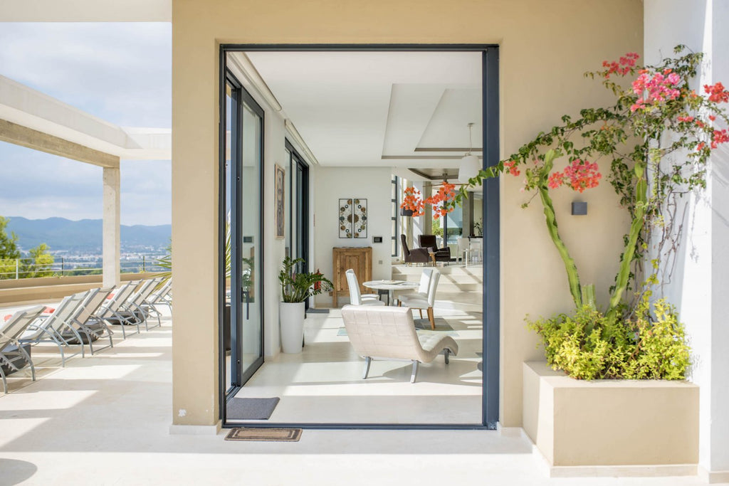 Hillside Contemporary Style Ibiza Villa with Panoramic Views of the Island near Cala Roja Cove and Talamanca Beach in Ibiza Town