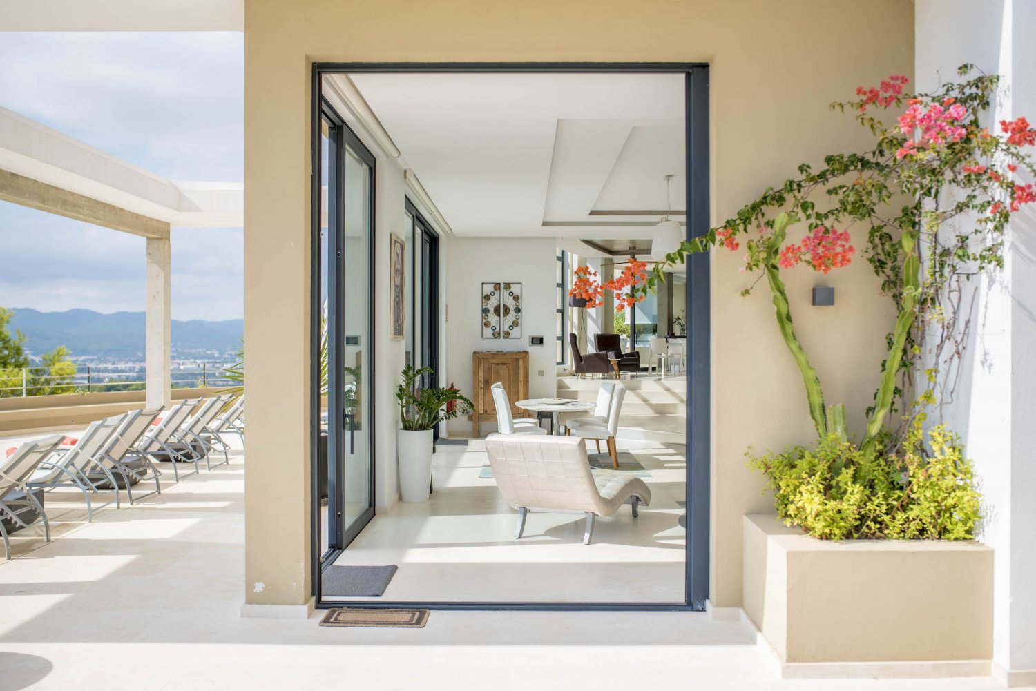 Hillside Contemporary Style Ibiza Villa with Panoramic Views of the Island near Cala Roja Cove and Talamanca Beach in Ibiza Town