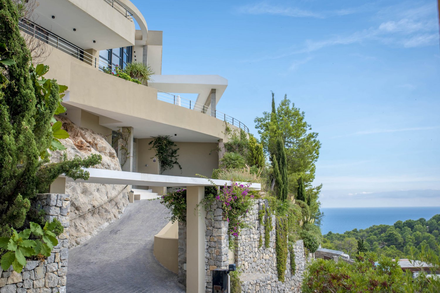 Hillside Contemporary Style Ibiza Villa with Panoramic Views of the Island near Cala Roja Cove and Talamanca Beach in Ibiza Town