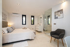 Hillside Contemporary Style Ibiza Villa with Panoramic Views of the Island near Cala Roja Cove and Talamanca Beach in Ibiza Town
