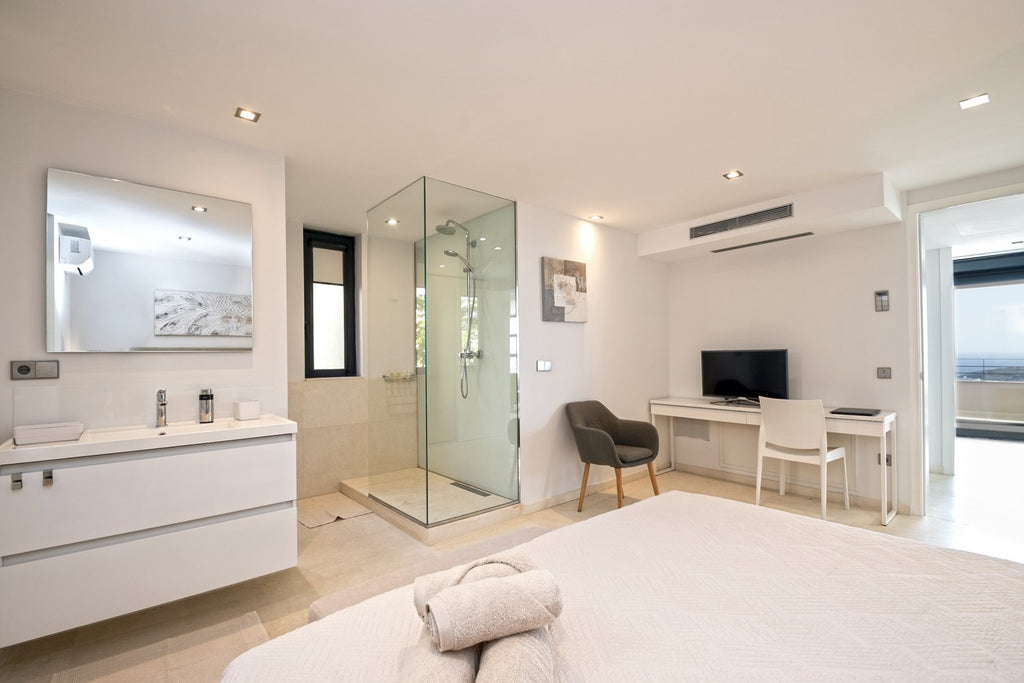 Hillside Contemporary Style Ibiza Villa with Panoramic Views of the Island near Cala Roja Cove and Talamanca Beach in Ibiza Town