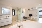 Hillside Contemporary Style Ibiza Villa with Panoramic Views of the Island near Cala Roja Cove and Talamanca Beach in Ibiza Town
