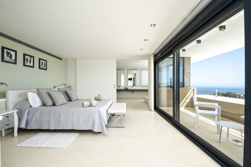 Hillside Contemporary Style Ibiza Villa with Panoramic Views of the Island near Cala Roja Cove and Talamanca Beach in Ibiza Town