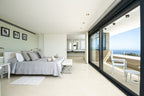 Hillside Contemporary Style Ibiza Villa with Panoramic Views of the Island near Cala Roja Cove and Talamanca Beach in Ibiza Town