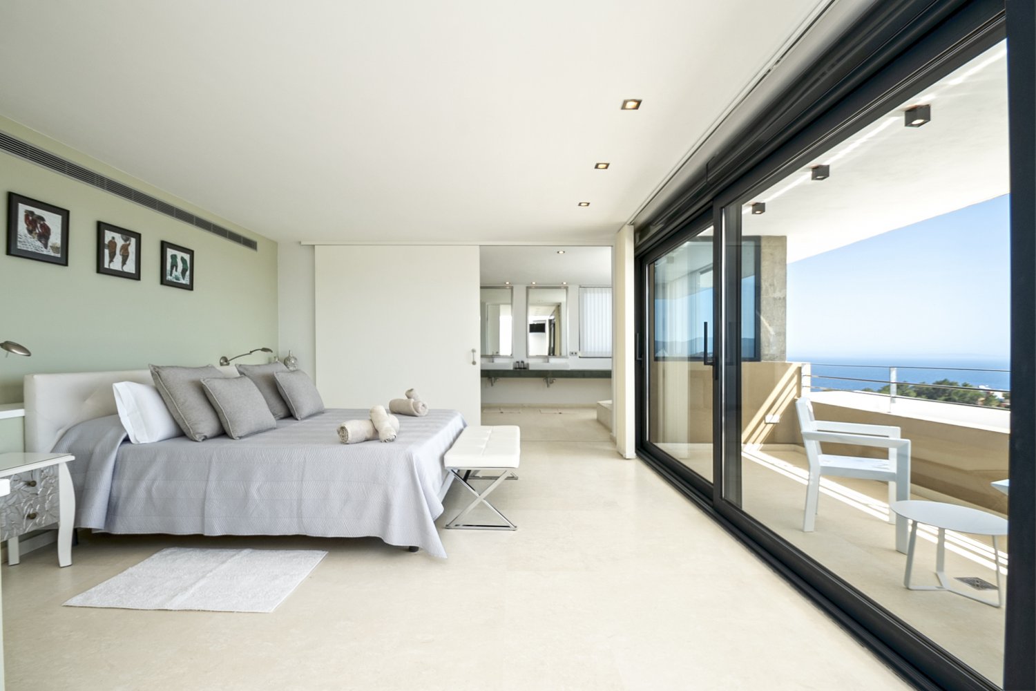 Hillside Contemporary Style Ibiza Villa with Panoramic Views of the Island near Cala Roja Cove and Talamanca Beach in Ibiza Town