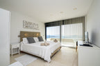 Hillside Contemporary Style Ibiza Villa with Panoramic Views of the Island near Cala Roja Cove and Talamanca Beach in Ibiza Town