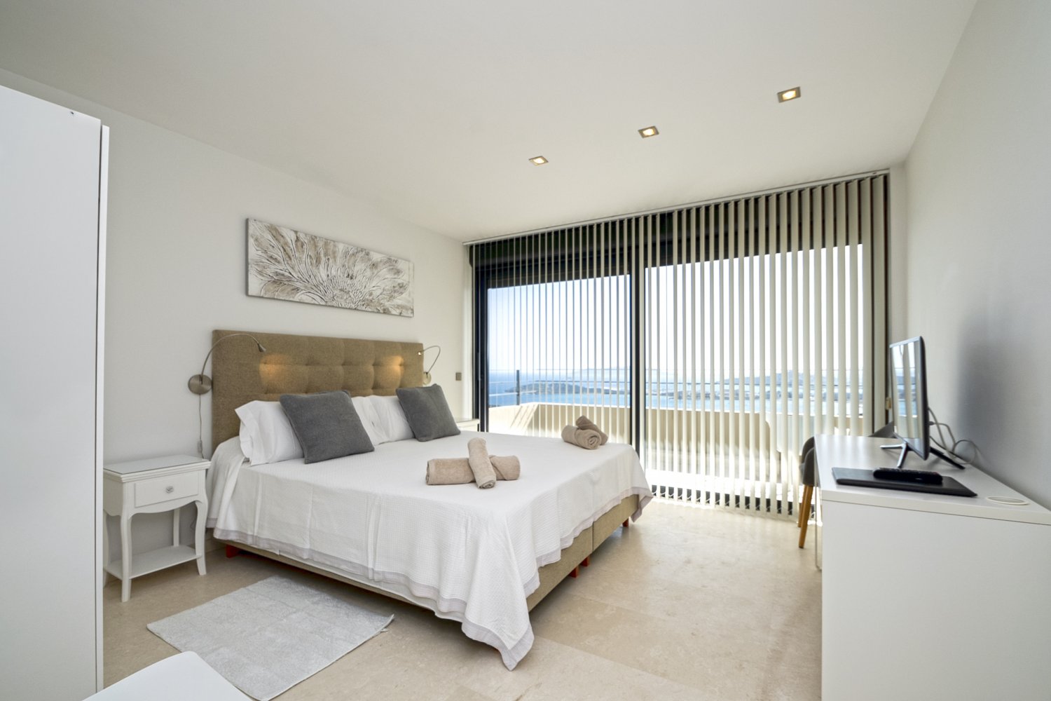 Hillside Contemporary Style Ibiza Villa with Panoramic Views of the Island near Cala Roja Cove and Talamanca Beach in Ibiza Town
