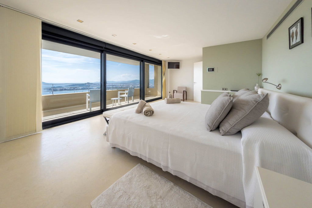 Hillside Contemporary Style Ibiza Villa with Panoramic Views of the Island near Cala Roja Cove and Talamanca Beach in Ibiza Town
