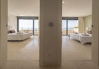 Hillside Contemporary Style Ibiza Villa with Panoramic Views of the Island near Cala Roja Cove and Talamanca Beach in Ibiza Town