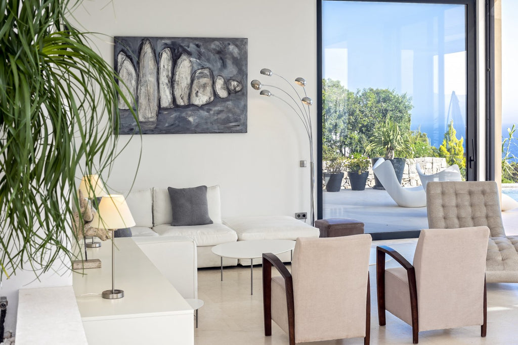 Hillside Contemporary Style Ibiza Villa with Panoramic Views of the Island near Cala Roja Cove and Talamanca Beach in Ibiza Town