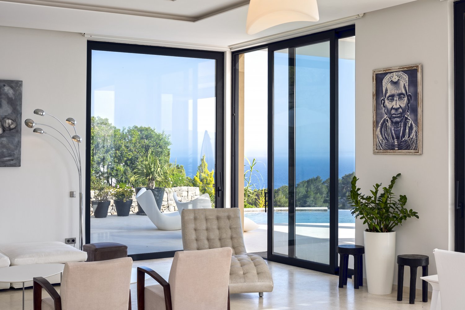 Hillside Contemporary Style Ibiza Villa with Panoramic Views of the Island near Cala Roja Cove and Talamanca Beach in Ibiza Town