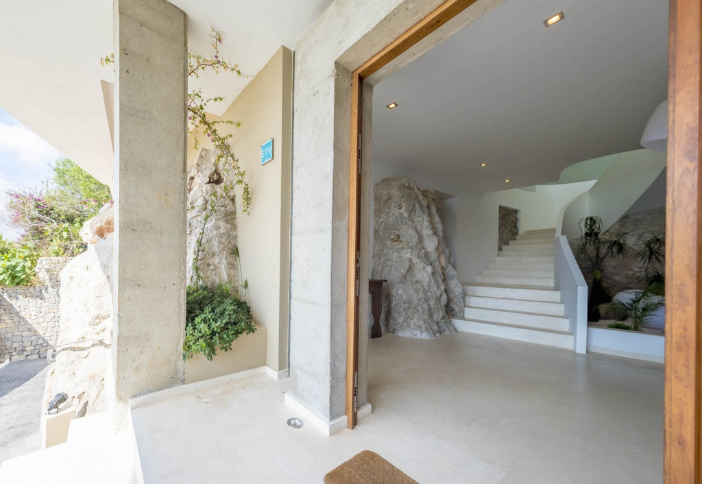 Hillside Contemporary Style Ibiza Villa with Panoramic Views of the Island near Cala Roja Cove and Talamanca Beach in Ibiza Town