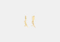 COACH® Women's Pendientes Huggie Skeletal Rexy en Amarillo/gold | Métal