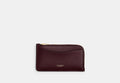 COACH® Women's Tarjetero New York Con Cremallera Y Bloques De Color en Rojo | Cuir