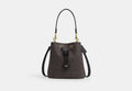 COACH® Women's Bolso Bucket Rowan En Lona De Firma en Castaño | Pvc
