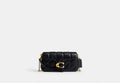 COACH® Women's Bolso Cruzado Tabby 19 Con Cadena Y Acolchado en Negro | Cuir