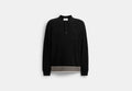COACH® Men's Polo De Punto Con Bolsillo Y Manga Larga en Negro, Talla Mediano | Coton