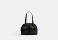 COACH® Women's Bolso Turnlock Twin 20 en Negro | Cuir