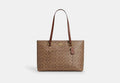 COACH® Women's Bolso Tote Station En Lona De Firma en Castaño | Pvc