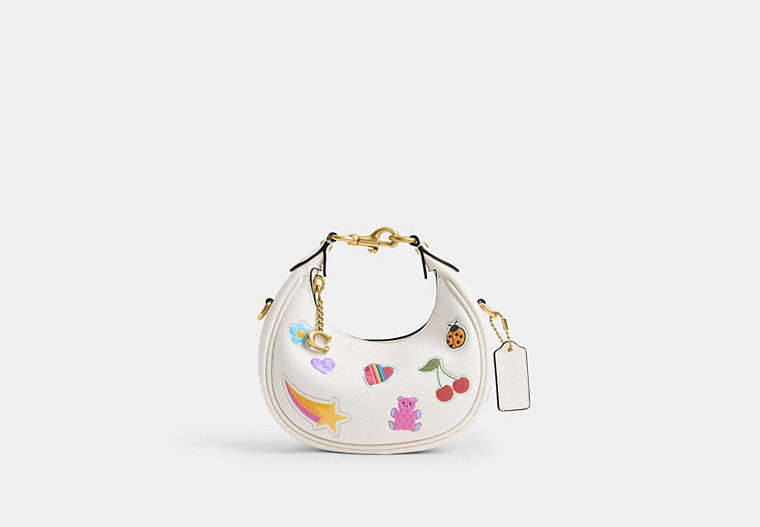 COACH® Women's Bolso Jonie Con Estampado De Pegatinas en Blanco | Cuir