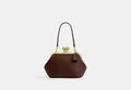 COACH® Women's Bolso Frame Kisslock 16 en Castaño | Cuir