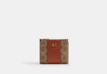 COACH® Women's Billetera Fina Básica En Lona De Firma | Pvc