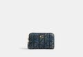 COACH® Women's Tarjetero Pequeño Básico Con Cremallera Perimetral De Tela Vaquera De Algodón Regenerativo Con Acolchado en Azul | Denim