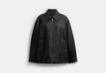 COACH® Women's Chaqueta De Piel Exquisita Extragrande en Negro, Talla Mediano