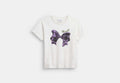 COACH® Women's Camiseta En Algodón Orgánico Con Lazo en Blanco, Talla Mediano